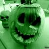 This is a particularly disturbing pumpkin carved by one of our ghouls.  Most just place a candle inside....